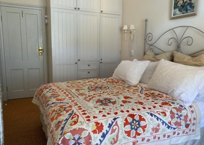 Indian linen and Turkish bedcover. Holiday accommodation in Kalk Bay. The Kalk Bay Portfolio